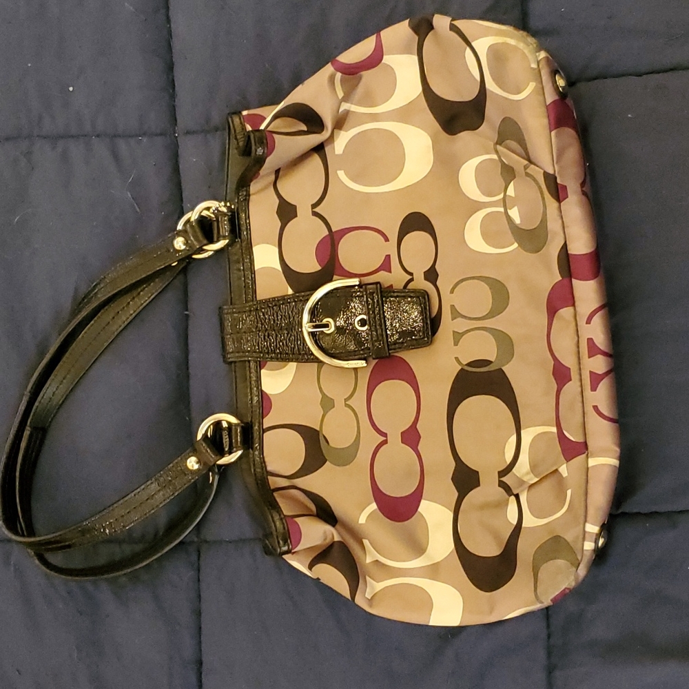 Coach purse. Purple, white, silver, black.